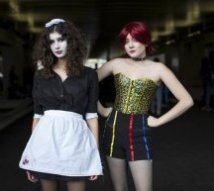 Image: Olivia Alicandri dressed as Magenta and Olivia Viteznik dressed as Columbia, both characters from Rocky Horror Picture Show, pose for photos on day two of New York Comic Con in Manhattan, New York